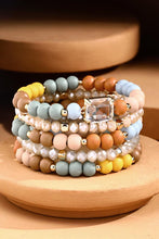 Load image into Gallery viewer, 5 Layered Wood Bead Bracelet with Glass Charm